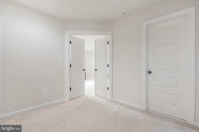 interior space with light colored carpet