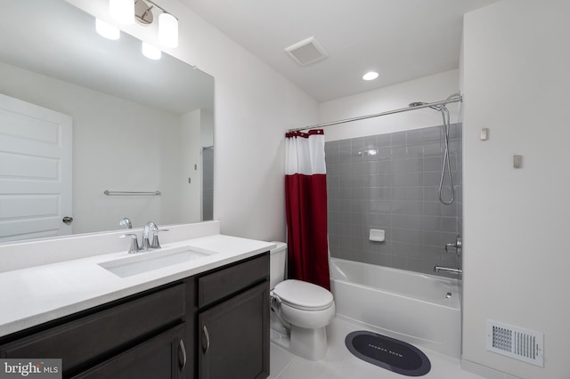 full bathroom featuring tile patterned floors, toilet, shower / bath combination with curtain, and vanity