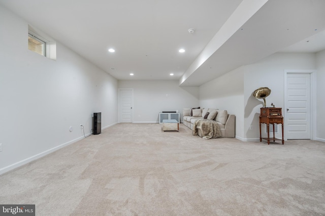 living area with light carpet