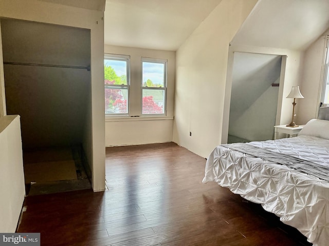 bedroom with wood finished floors