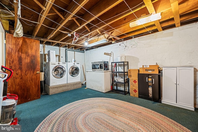 laundry area with washing machine and clothes dryer