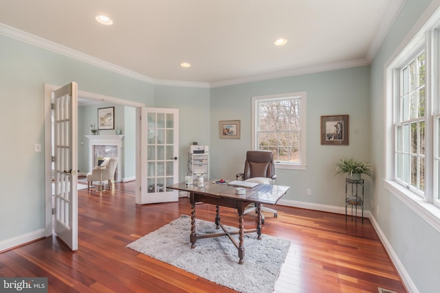 office area featuring a wealth of natural light, french doors, baseboards, and crown molding