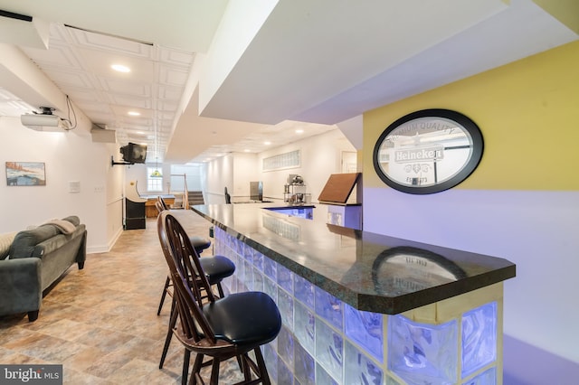 bar featuring a dry bar, recessed lighting, and baseboards