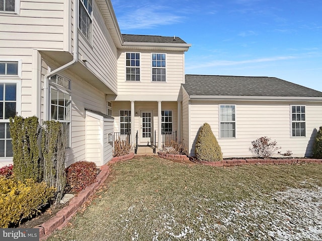 exterior space with a front yard