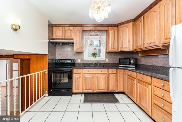 kitchen featuring sink, dark stone countertops, electric range, white refrigerator, and light tile patterned flooring