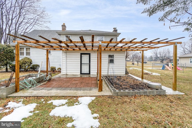 back of house featuring a playground, a lawn, a patio area, and a pergola