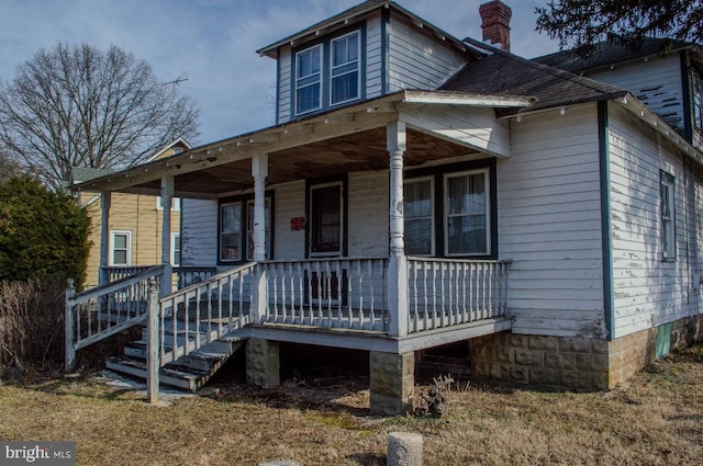 view of front of home featuring covered porch