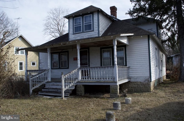 view of front of home featuring covered porch