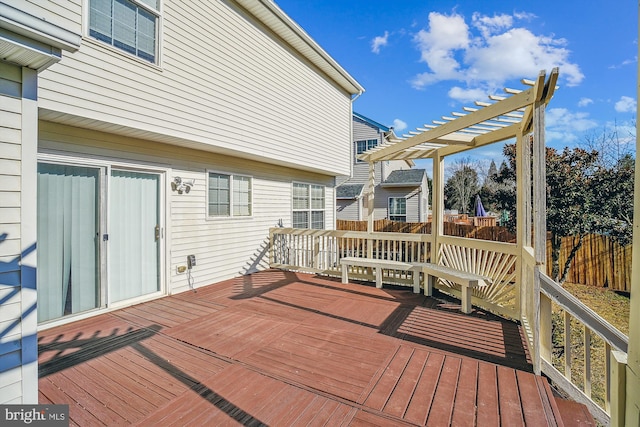 wooden deck with a pergola