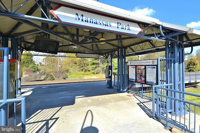 view of car parking featuring water heater