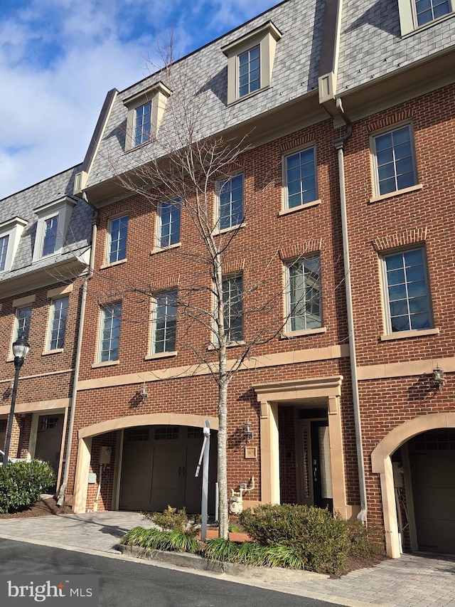 view of building exterior featuring driveway