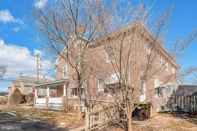 view of home's exterior featuring covered porch