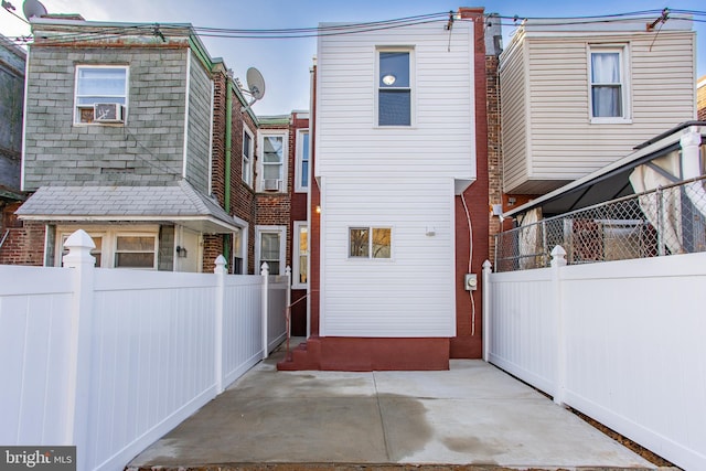 exterior space featuring cooling unit and a patio