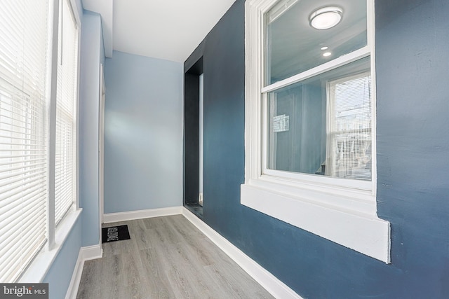 corridor featuring light hardwood / wood-style flooring