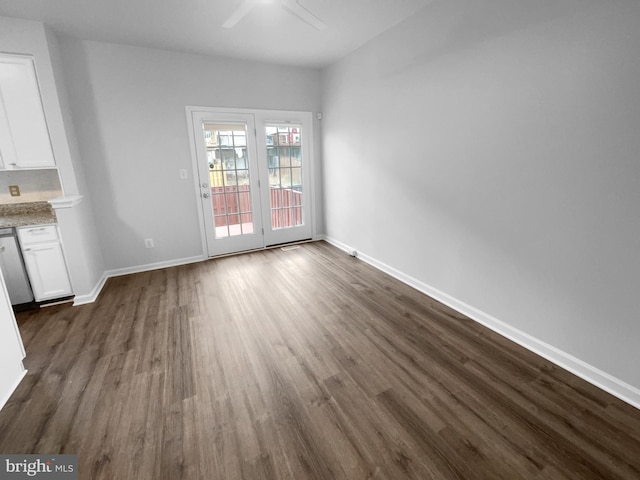 interior space featuring dark hardwood / wood-style floors and ceiling fan