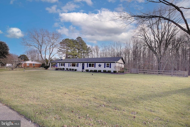 single story home with a front yard