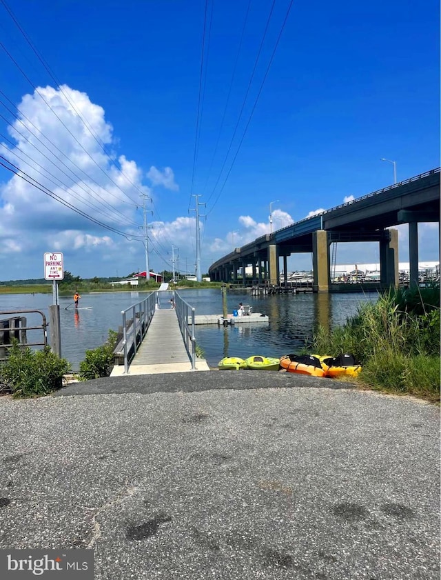 view of dock with a water view