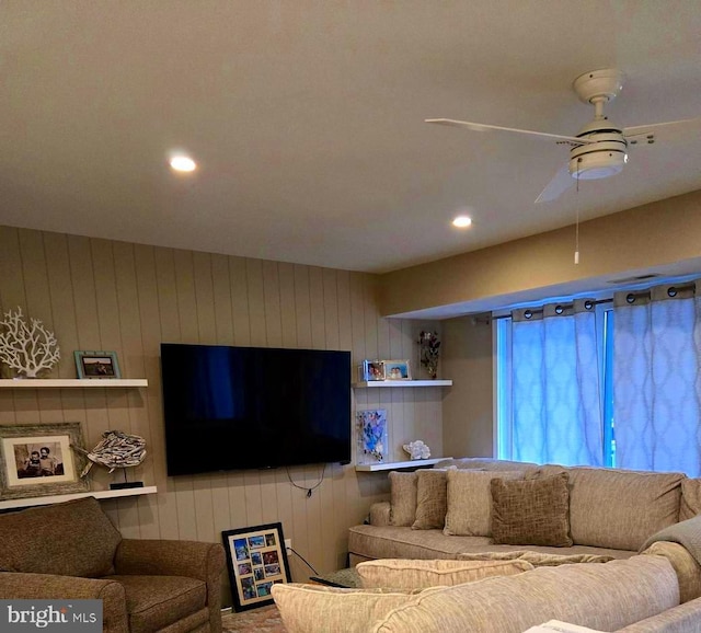 living room featuring ceiling fan and recessed lighting