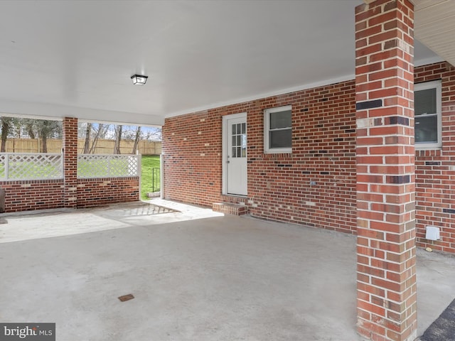 view of patio / terrace featuring fence