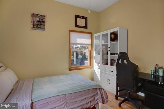 bedroom featuring light wood-type flooring