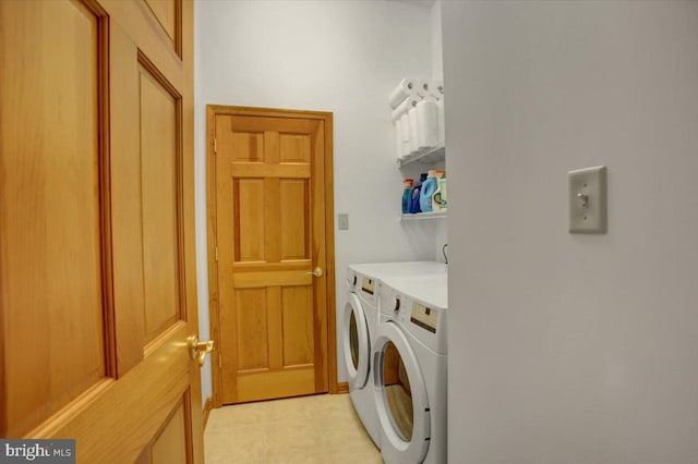 laundry room with washer and dryer