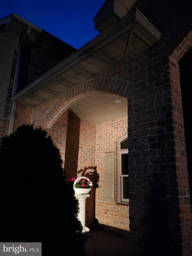 view of property exterior at twilight