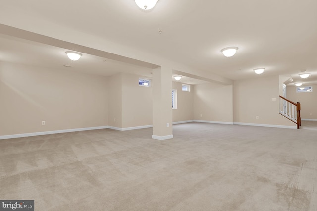 basement with light carpet