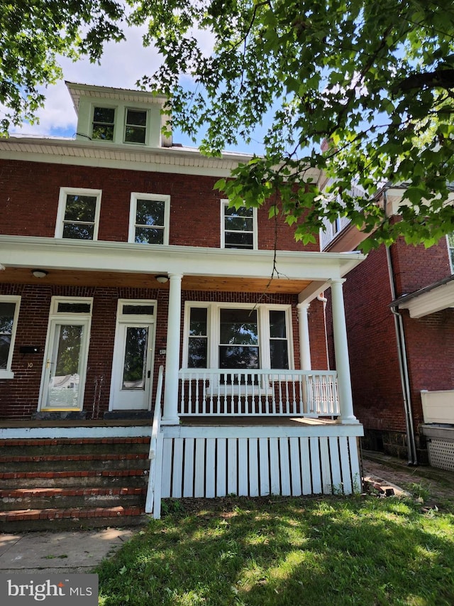 view of front of house featuring covered porch