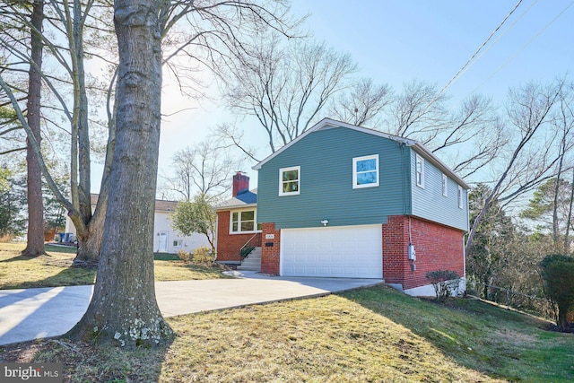 view of front facade with a garage and a front lawn