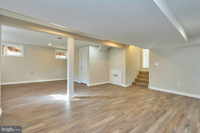 basement with light wood-type flooring