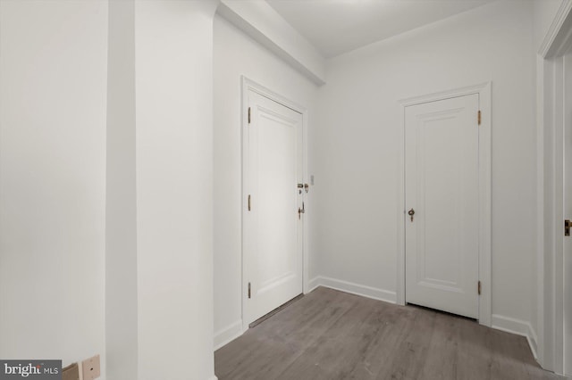 corridor featuring light hardwood / wood-style flooring