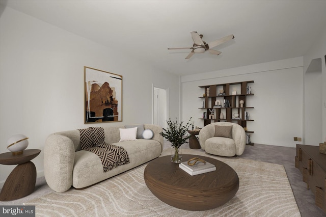 carpeted living room featuring ceiling fan