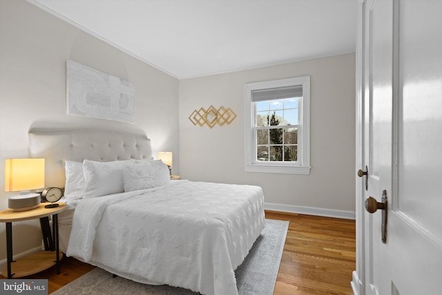 bedroom with light hardwood / wood-style flooring