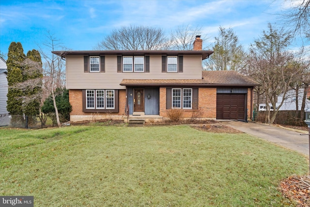 front facade with a garage and a front yard