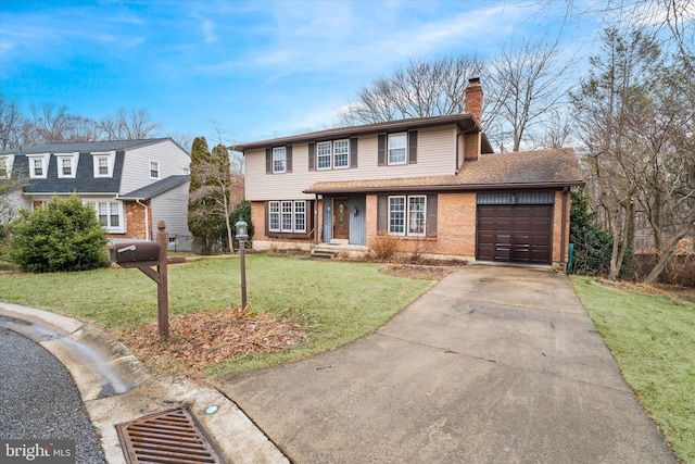 view of front property with a garage and a front lawn