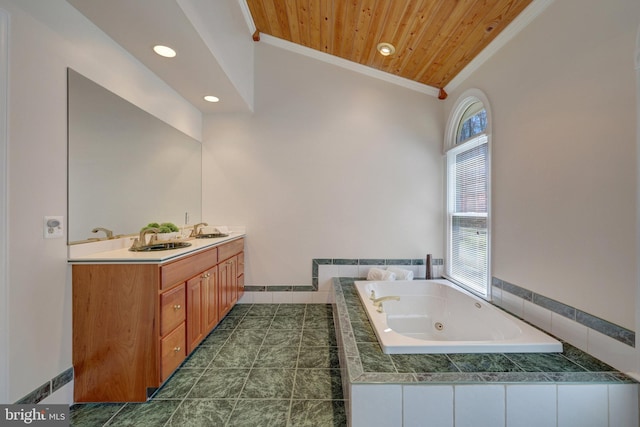 bathroom with a jetted tub, wooden ceiling, crown molding, and a sink