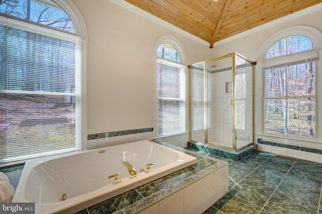 bathroom featuring vaulted ceiling, a stall shower, a jetted tub, and wood ceiling