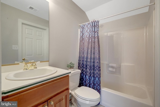 bathroom featuring toilet, vanity, visible vents, and shower / bathtub combination with curtain