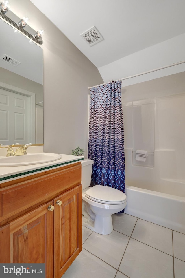 full bath with toilet, vanity, visible vents, and tile patterned floors