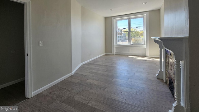 unfurnished living room with hardwood / wood-style floors