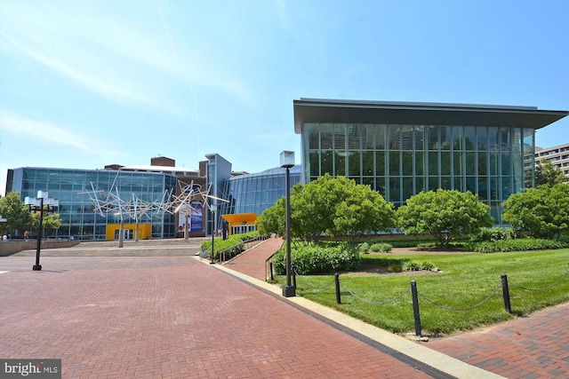 view of home's community with a lawn