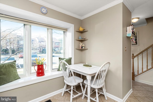 tiled dining area with ornamental molding