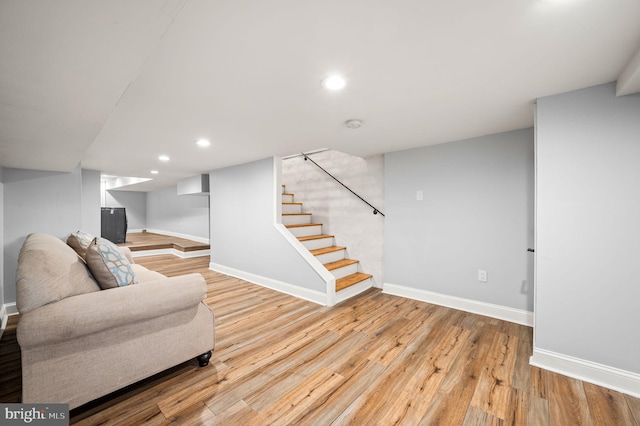 living room with light hardwood / wood-style floors