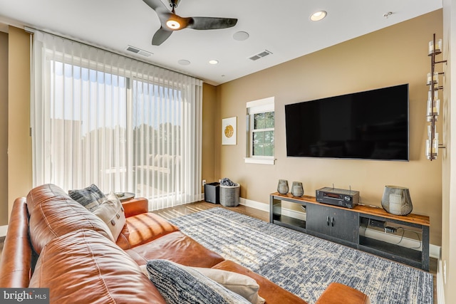 living room with ceiling fan