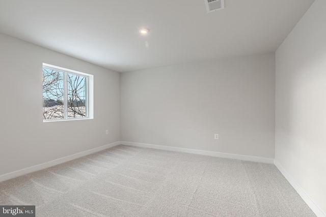 view of carpeted spare room