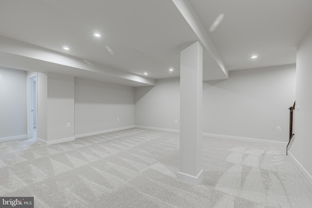 basement with light colored carpet