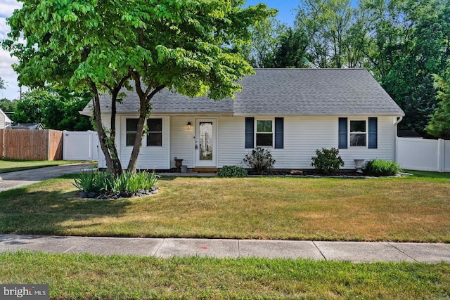 single story home with a front yard