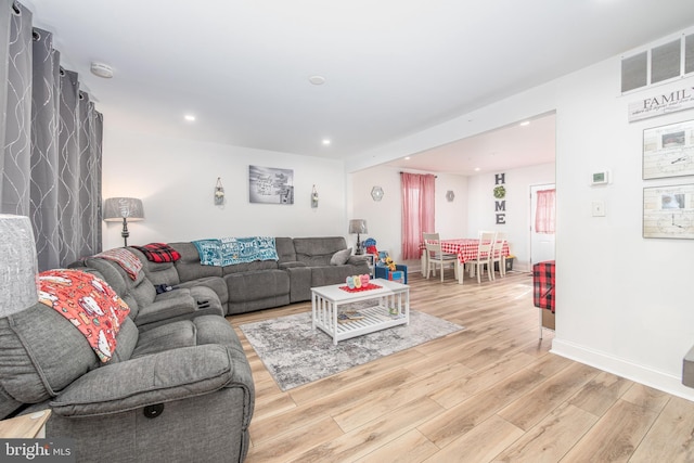 living room with hardwood / wood-style flooring