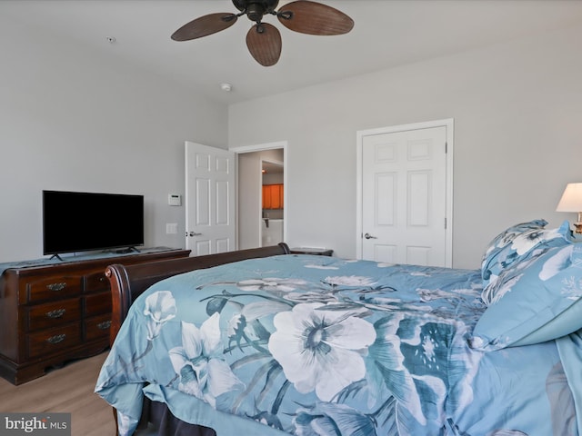 bedroom with light hardwood / wood-style flooring and ceiling fan