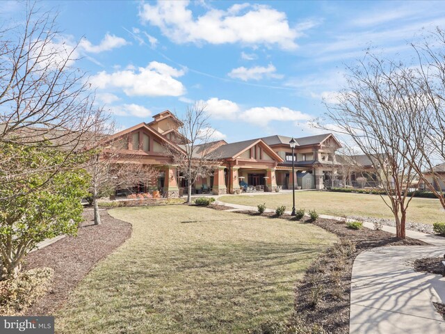 view of front of property with a front lawn